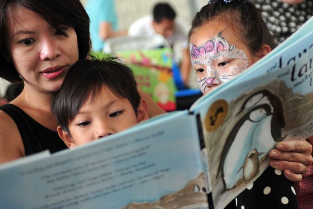 People attend a reading session outside the National Library building in Singapore. Photo: Xinhua