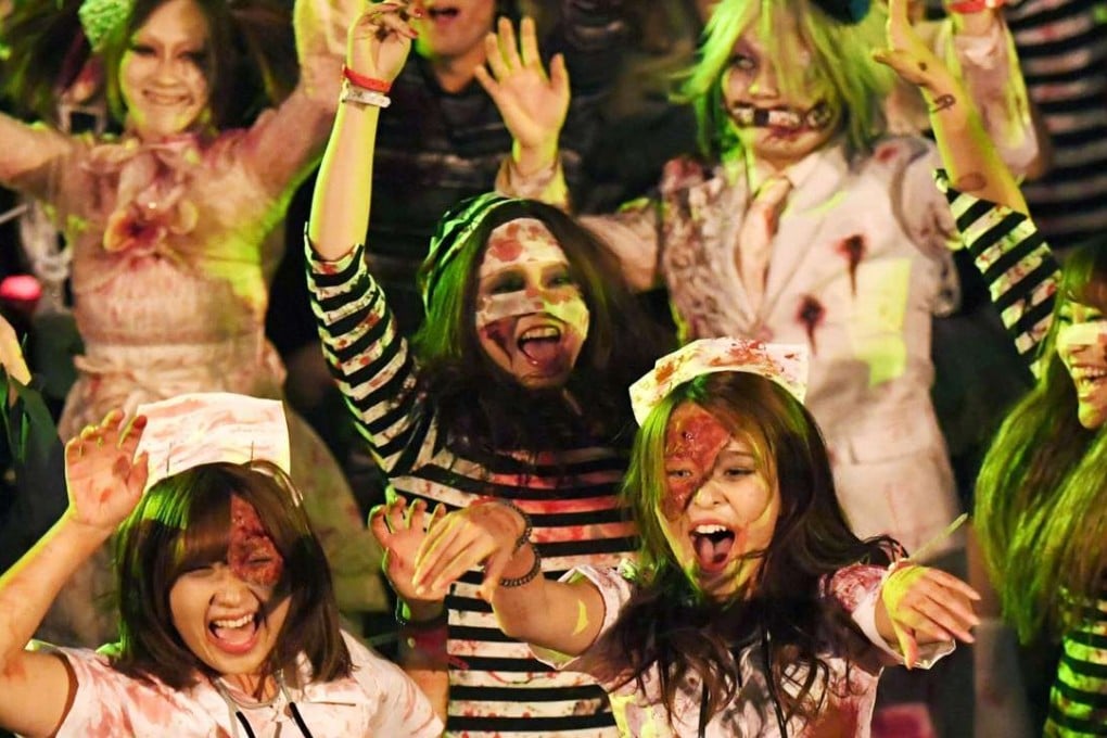 People dressed as zombies join the Halloween event at Universal Studios Japan in Osaka. Photo: Kyodo