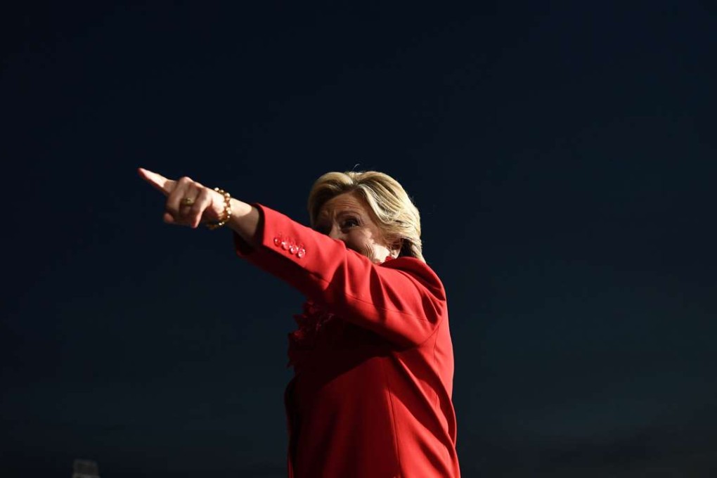 US Democratic presidential nominee Hillary Clinton points to supporters during a campaign rally in Cincinnati, Ohio, on Monday. Photo: AFP