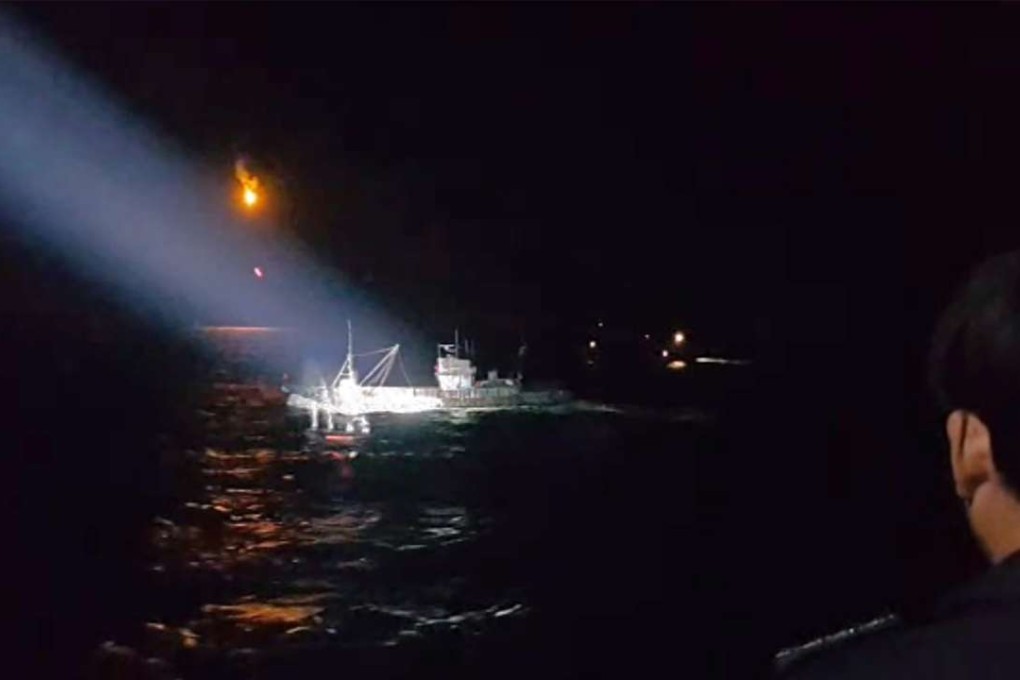 A handout image taken and released by South Korea's Ministry of Public Safety and Security shows a South Korean coastguard vessel allegedly firing at a Chinese fishing trawler near the South's Yellow Sea border with North Korea. Photo: AFP