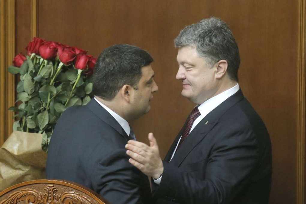 Ukraine's President Petro Poroshenko (right) and Prime Minister Volodymyr Groysman. Photo: AP
