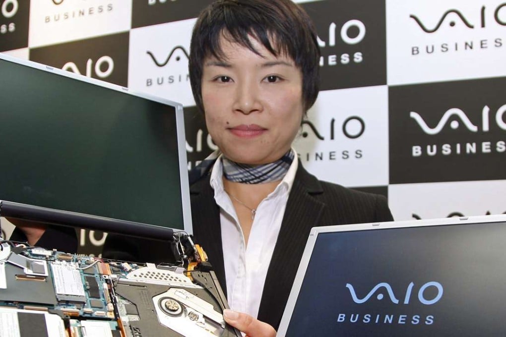 Sony employee Miwa Asakura displays the latest in the Vaio line of laptops on November 2006, a product lineup that would struggle in the coming years and eventually be sold-off in 2014. Photo: AFP