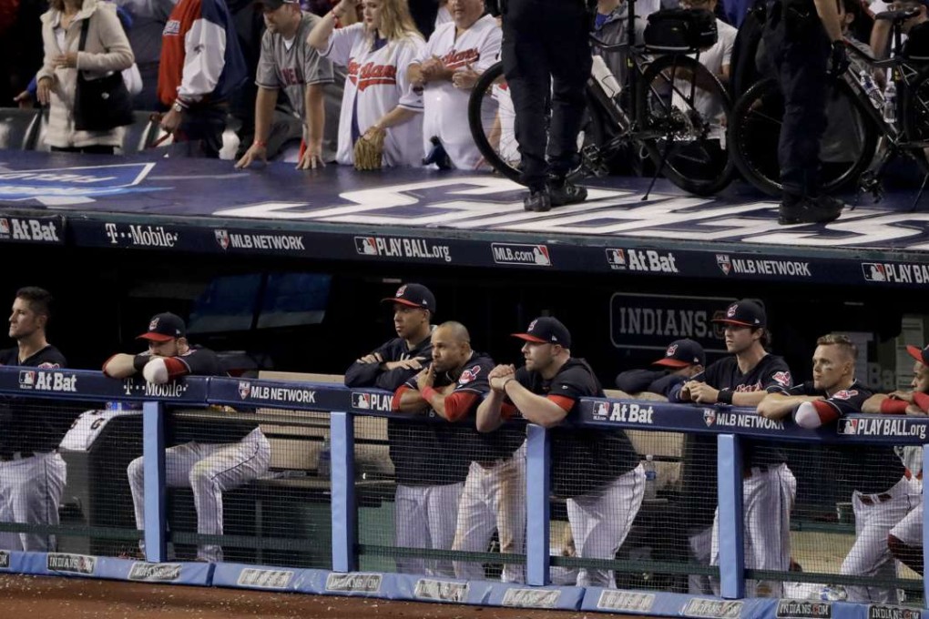 Cleveland Indians watch the Chicago Cubs celebrate after losing game seven of the Major League Baseball World Series. Photo: AP