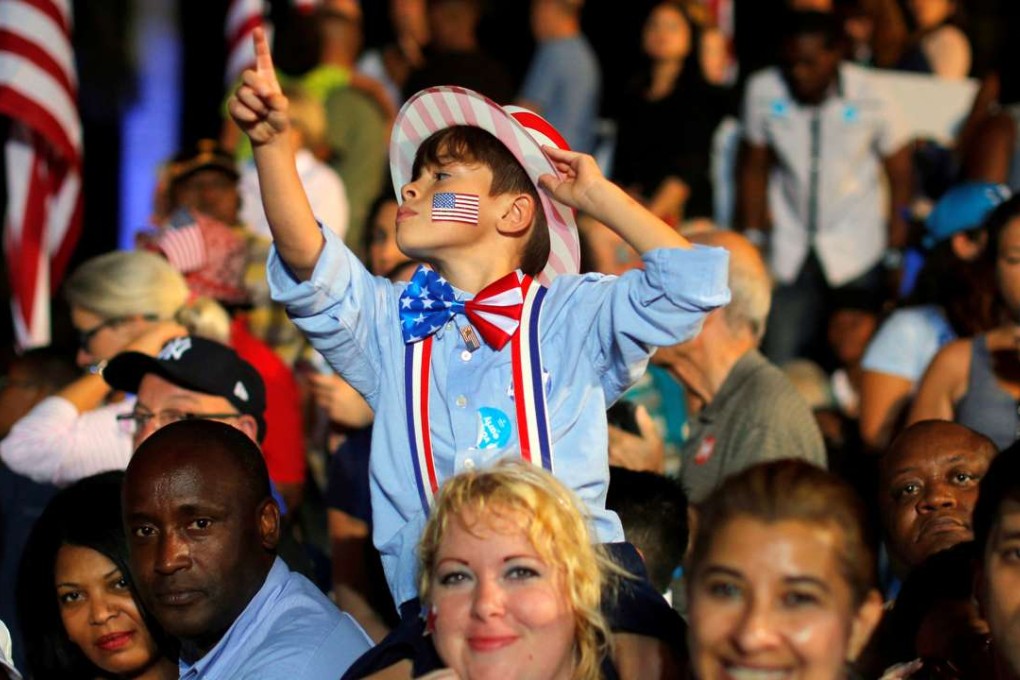 Supporters of presidential candidate Hillary Clinton wait to hear her speak at a rally in Fort Lauderdale, Florida. Photo: Reuters