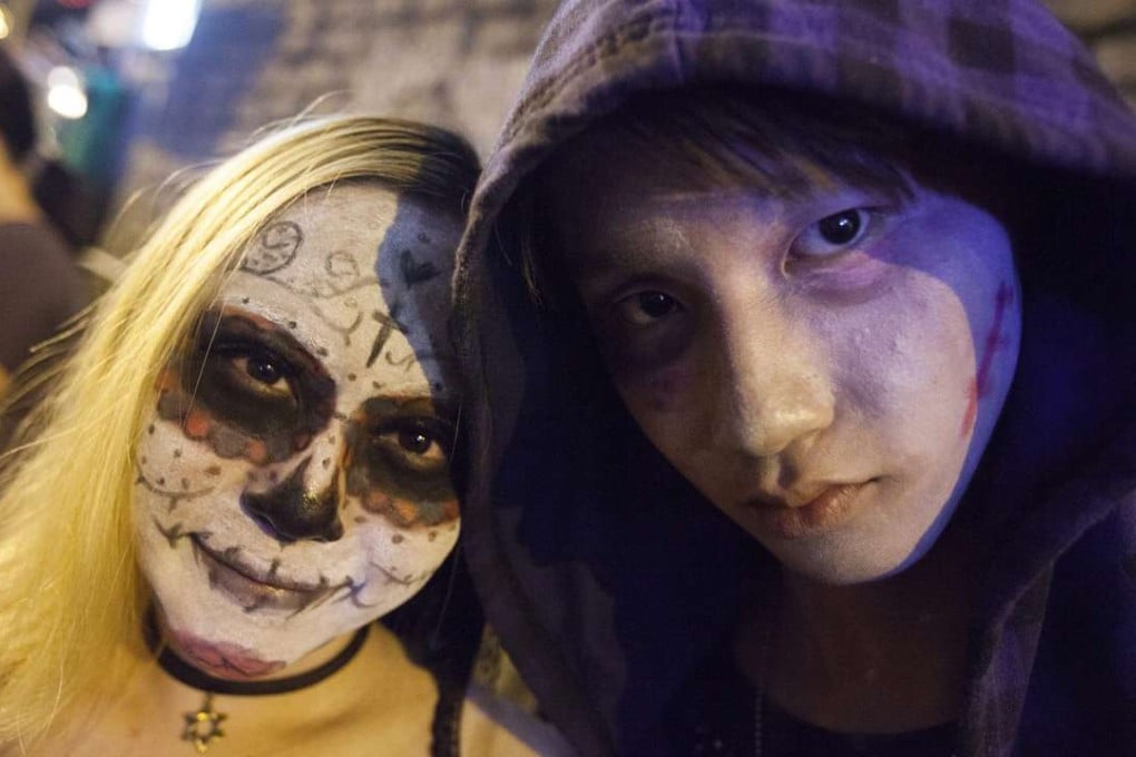 It’s only Halloween: Hong Kong’s partygoers celebrate in Lan Kwai Fong. Photo: EPA