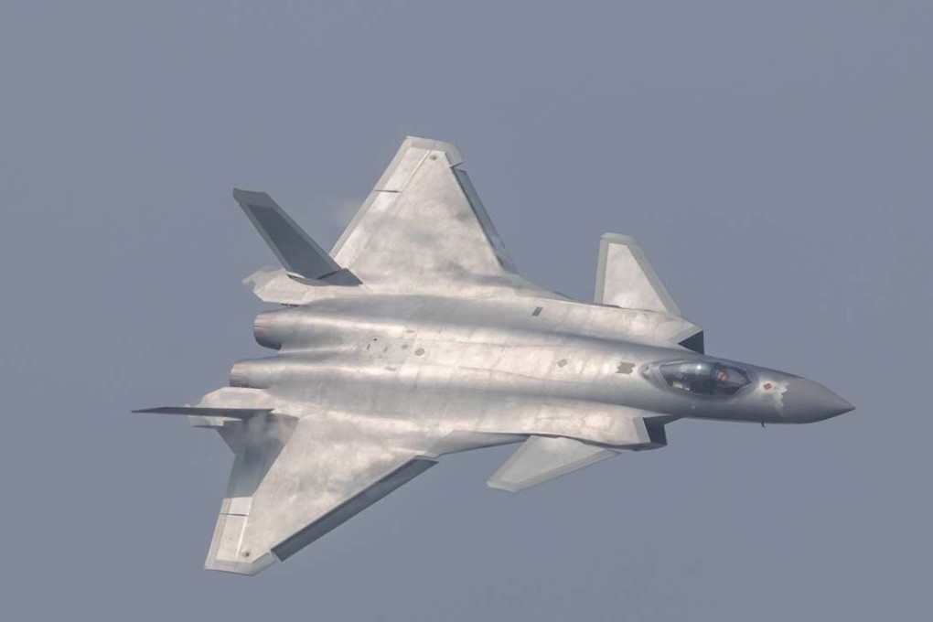 The J-20 stealth fighter pictured during a brief fly-past at the Zhuhai air show on Tuesday. Photo: Reuters