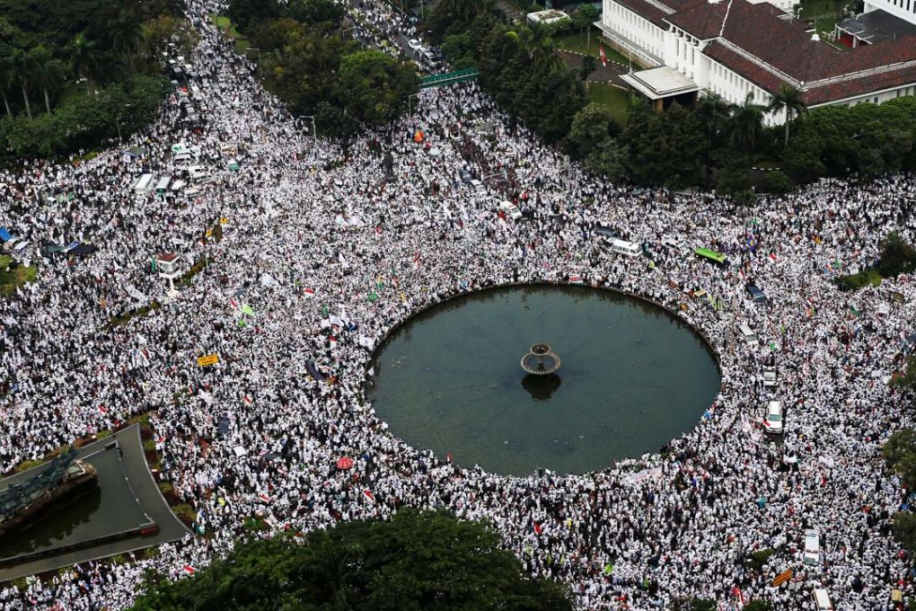 Hardline Muslim groups attending a protest against Jakarta’s governor Basuki Tjahaja Purnama. Photo: Reuters