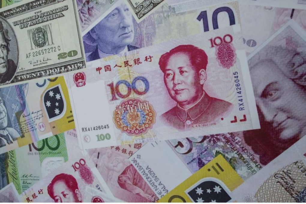 The central bank has set the yuan’s mid-point rate at 6.7514 against the US dollar, down 23 basis points on the previous fix, and slashed its mid-point rate against the pound to 8.4193, down 1,130 basis points. Photo: Reuters