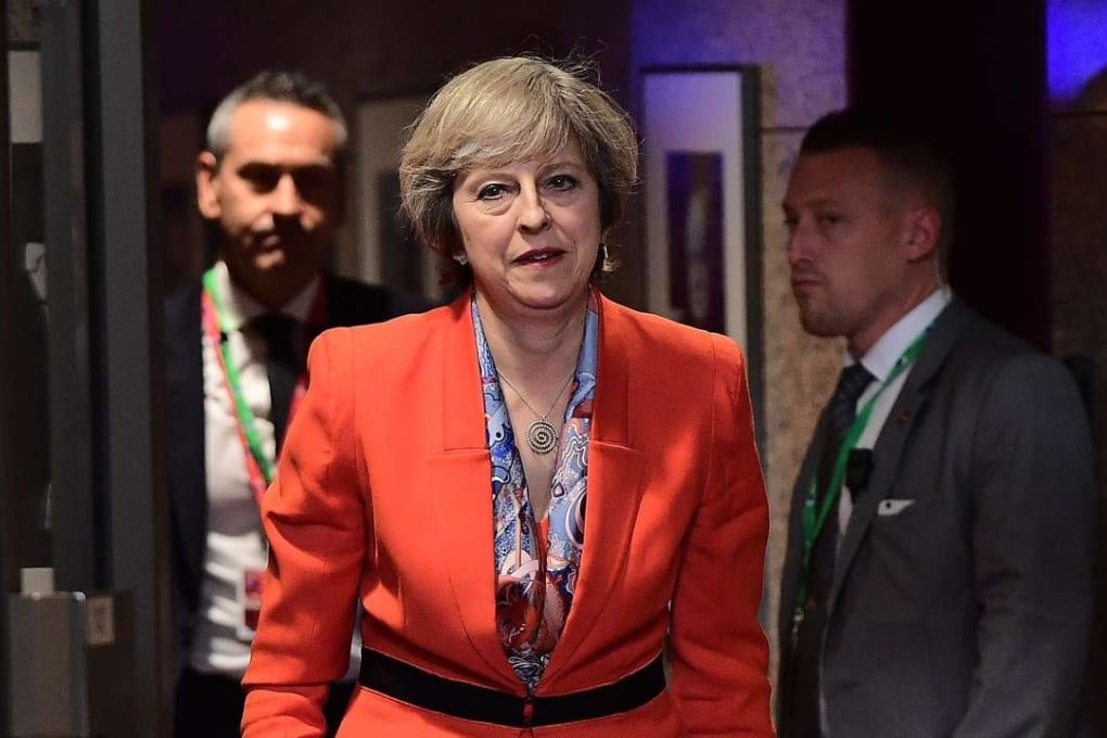 British Prime Minister Theresa May, pictured at a European Union leaders summit in Brussels on October 21, faces the prospect of a revolt from pro-EU Tories who want her to outline her Brexit strategy in a clearer fashion. Photo: AFP