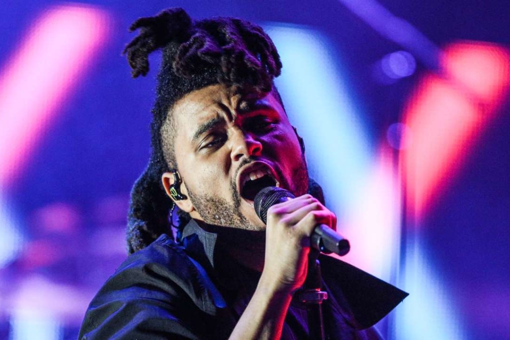 The Weeknd performs in Los Angeles in 2015. H&M has signed him the Grammy award winner to present a menswear collection due in shops in March 2017. Photo: AP
