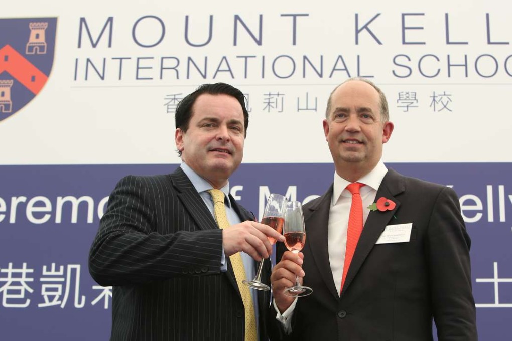 Gary Wright (left) and Mark Semmence from Mount Kelly International School attend the groundbreaking ceremony. Photo: Edmond So