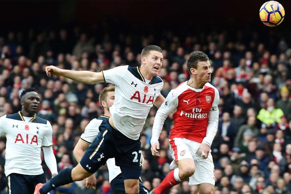 Tottenham's Kevin Wimmer scores an own goal during the English Premier League clash against Arsenal at the Emirates Stadium in London. The match ended 1-1. Photo: EPA