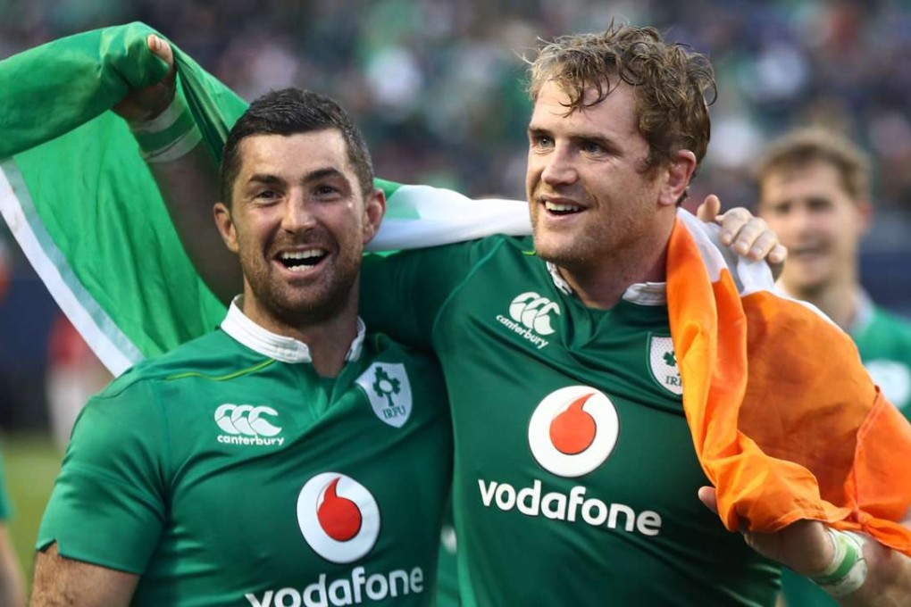 Rob Kearney and Jamie Heaslip of Ireland celebrate following their team’s 40-29 victory against New Zealand at Soldier Field. Photo: AFP