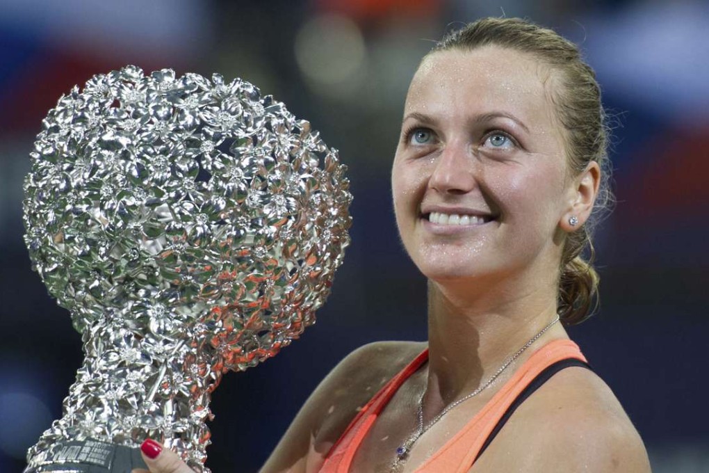 Petra Kvitova of the Czech Republic with the trophy after beating Elina Svitolina of Ukraine in the final of the WTA Elite Trophy tournament in Zhuhai. Photo: AP