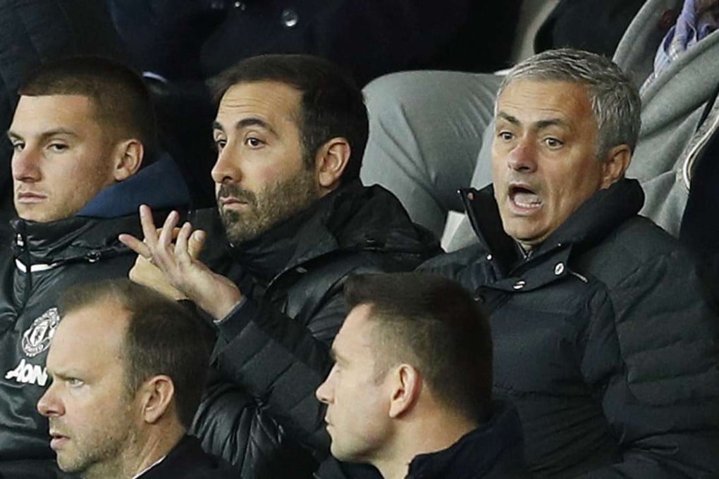 Manchester United manager Jose Mourinho looks frustrated as executive vice-chairman Ed Woodward looks on during the win over Swansea City. Photo: Reuters