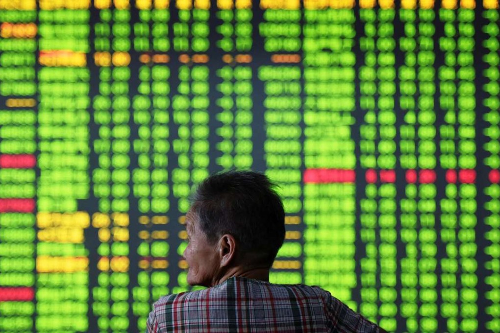Mainland Chinese investors like buying Hong Kong stocks as they want to diversify their assets due to yuan depreciation risks and falling returns from mainland assets, say analysts. Photo: Reuters