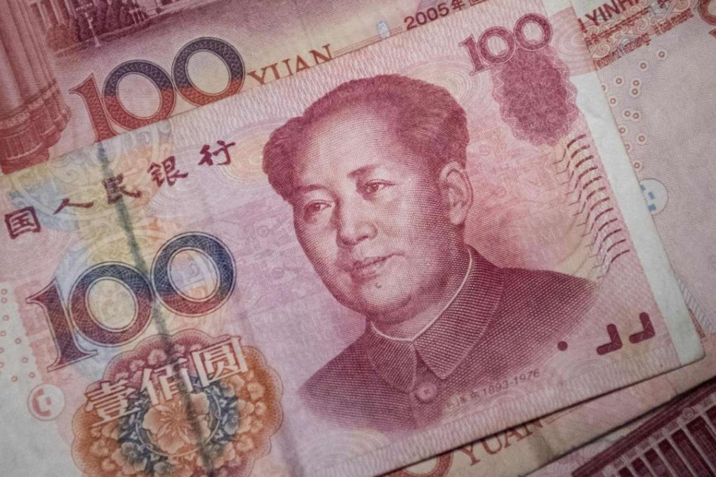 The People’s Bank of China cut the yuan’s daily reference rate by 211 basis point to 6.7725, the biggest reduction in more than two weeks. Photo: AFP