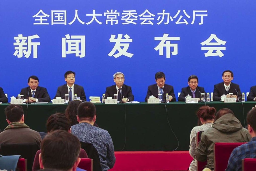 The press conference in Beijing this morning announcing the interpretation by the National People’s Congress Standing Committee. Photo: Simon Song