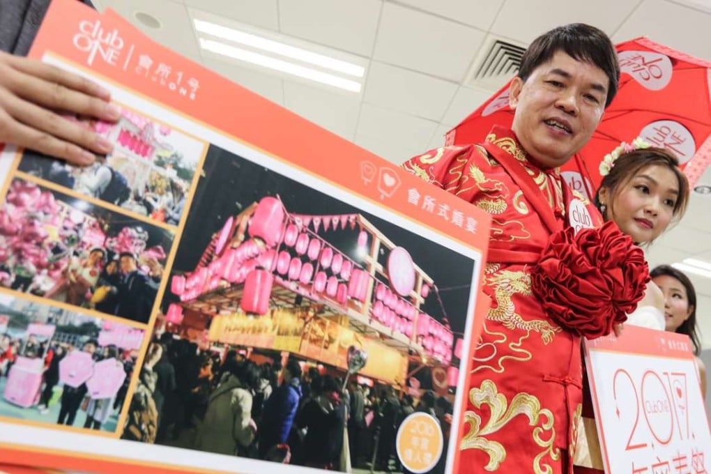 George Wong teams up with a model to present his bid for the Lunar New Year fair. Photo: Felix Wong