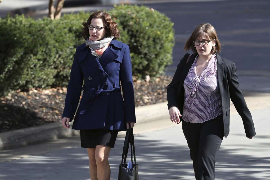 Sabrina Rubin Erdely, left, walks to the federal courthouse in Charlottesville with an attorney. Erdely has been ordered to pay US$2 million to a university administrator who was found to have been defamed by Erdeley’s story about a gang rape that never occurred. Photo: AP