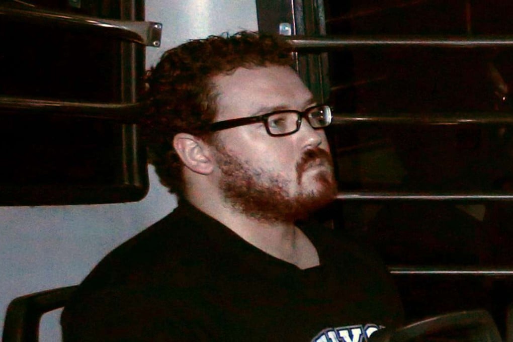 A 2014 photo of Rurik Jutting in a prison bus as he arrived at court. Photo: Reuters
