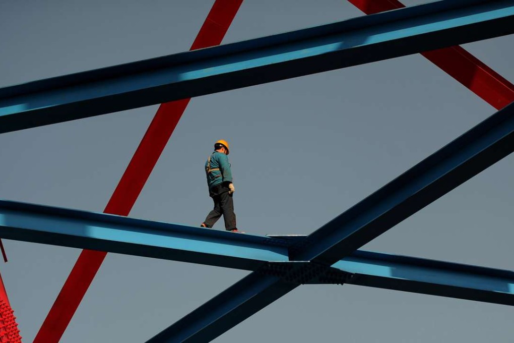 Some analysts believe that Beijing will need to soften its ‘no bailout’ stance in the event of a financial crisis. Photo: AFP