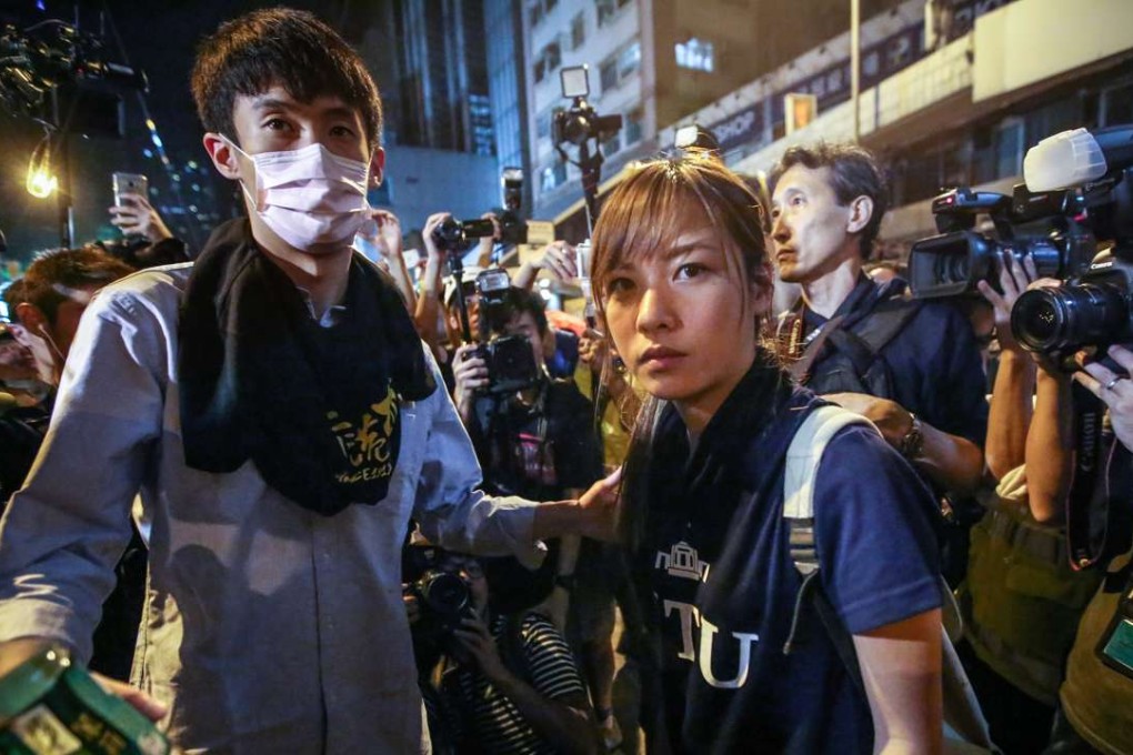 Sixtus “Baggio” Leung Chung-hang and Yau Wai-ching with protesters on Des Voeux street near the Chinese Liaison Office in Hong Kong during a protest against an expected interpretation of the city's constitution. Photo: Edward Wong