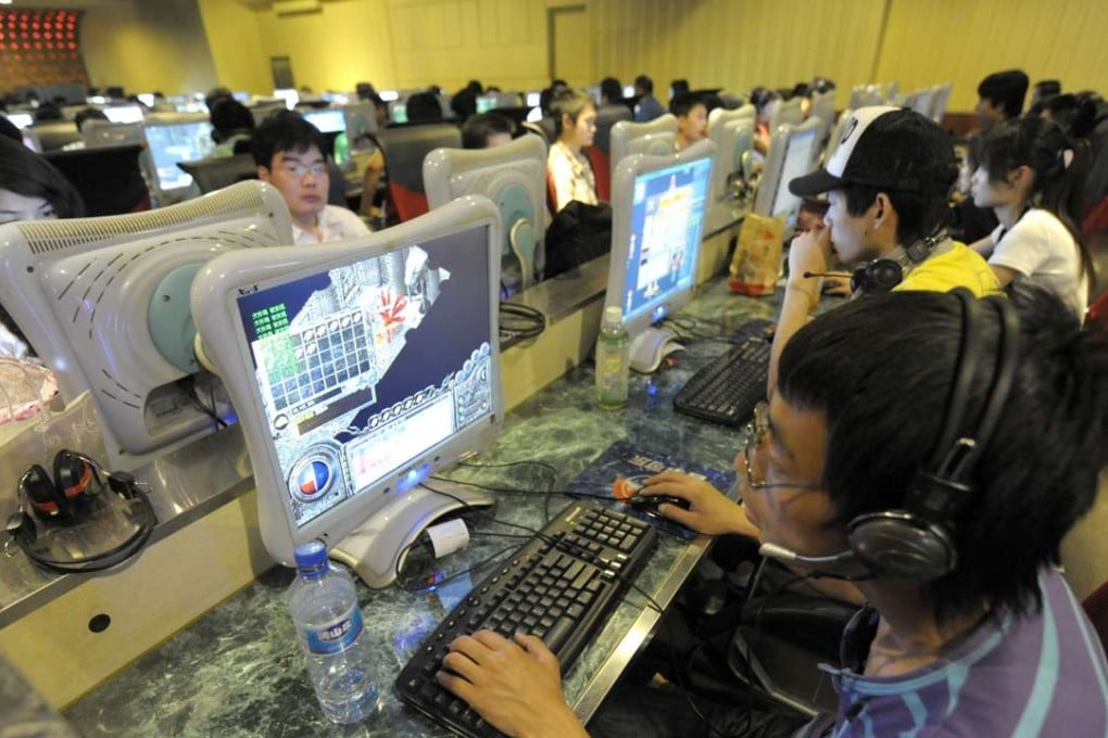 A file picture of people online at an internet cafe in Beijing. Photo: AFP