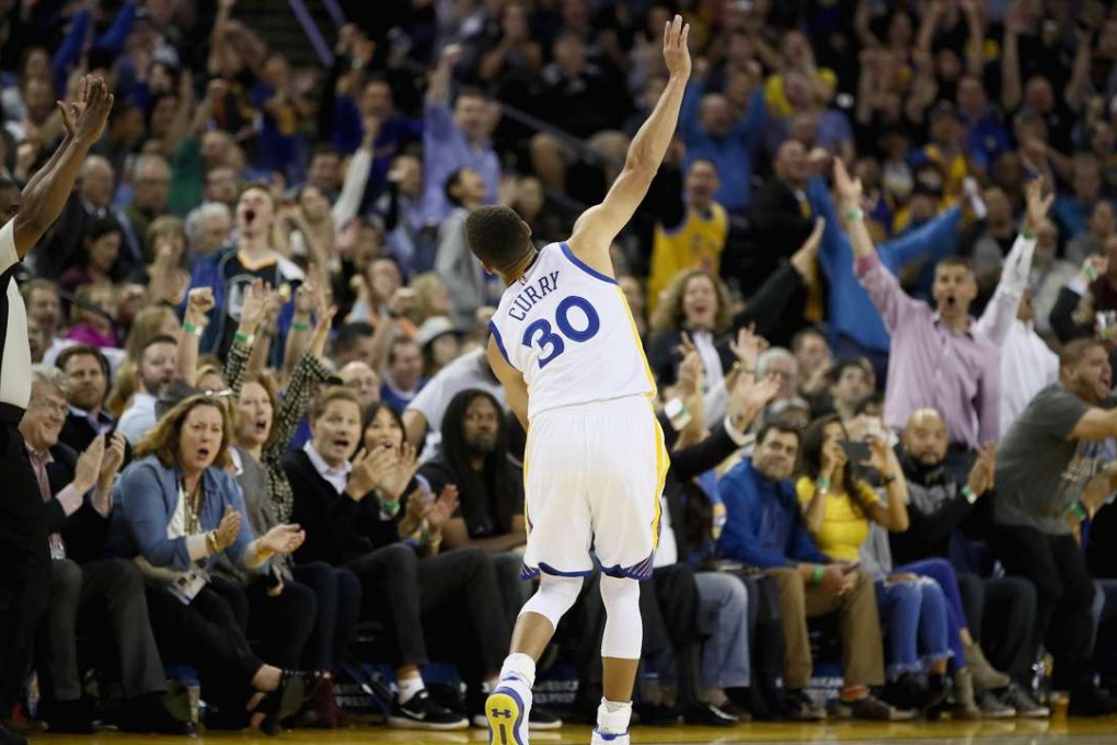 Stephen Curry of the Golden State Warriors retreats back down the court off balance after making one of his 13 three-pointers during the win over the New Orleans Pelicans. Photo: AFP
