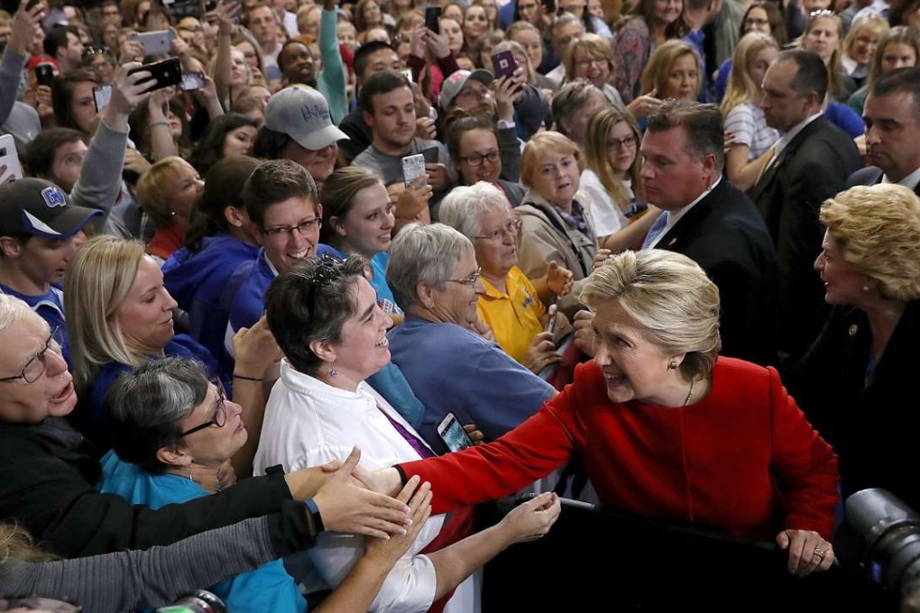 Democratic presidential nominee Hillary Clinton greets supporters during a campaign rally in Allendale, Michigan, on Monday. Photo: AFP