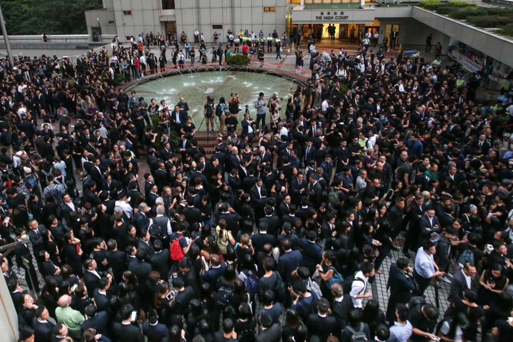 Lawyers gather outside the High Court to protest against Beijing’s interpretation. Photo: David Wong