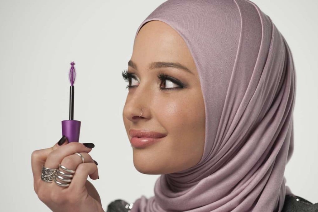 Beauty blogger Nura Afia is the first woman in a hijab to be featured in a CoverGirl ad. Photo: CoverGirl/AP