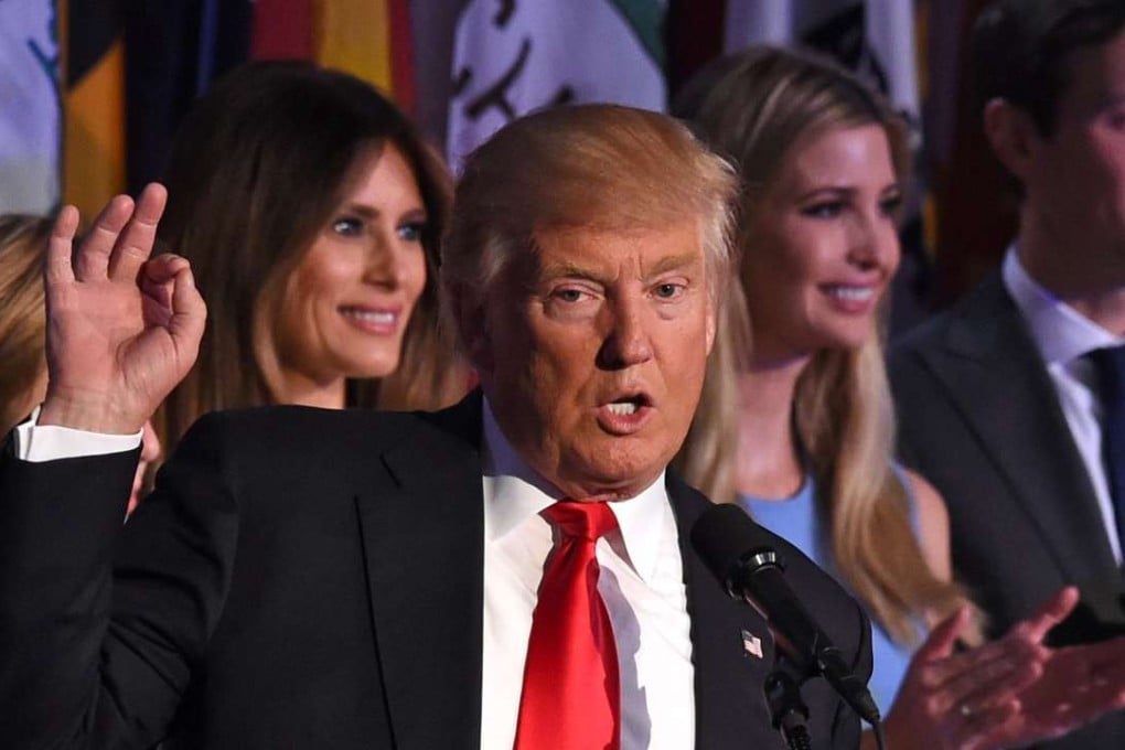 Republican presidential candidate Donald Trump with his family speaks to supporters during election night at the New York Hilton Midtown in New York. Photo: AFP
