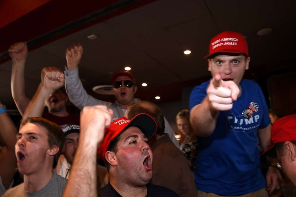 Donald Trump supporters celebrate his victory in the US election at the University of Sydney, Australia. Photo: AFP