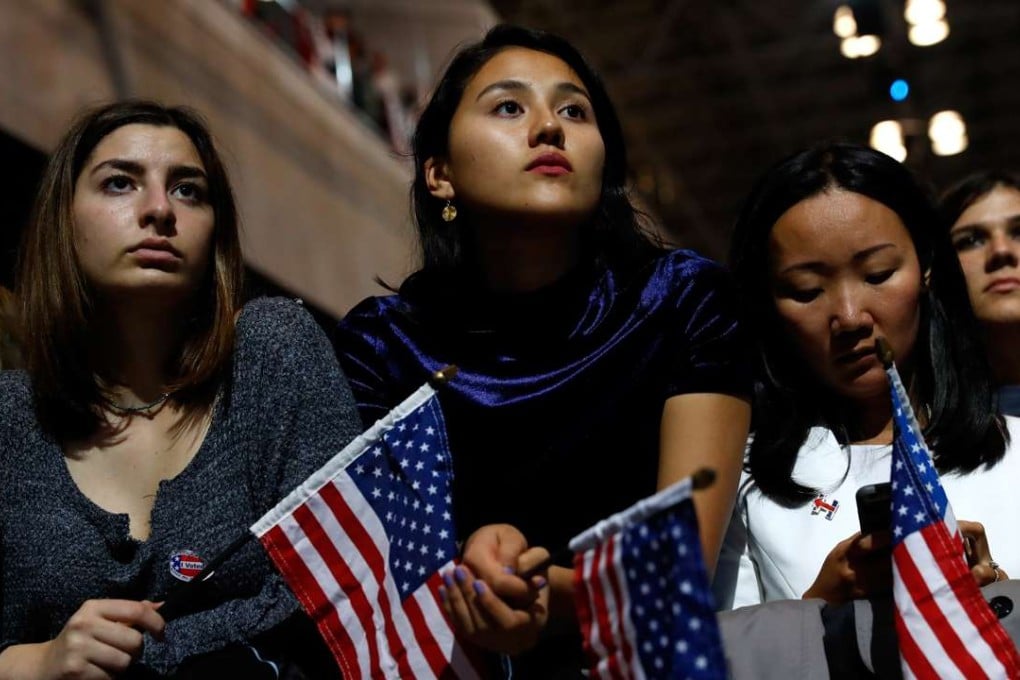 People watch the election results at Hillary Clinton’s election night event in New York City. Photo: AFP