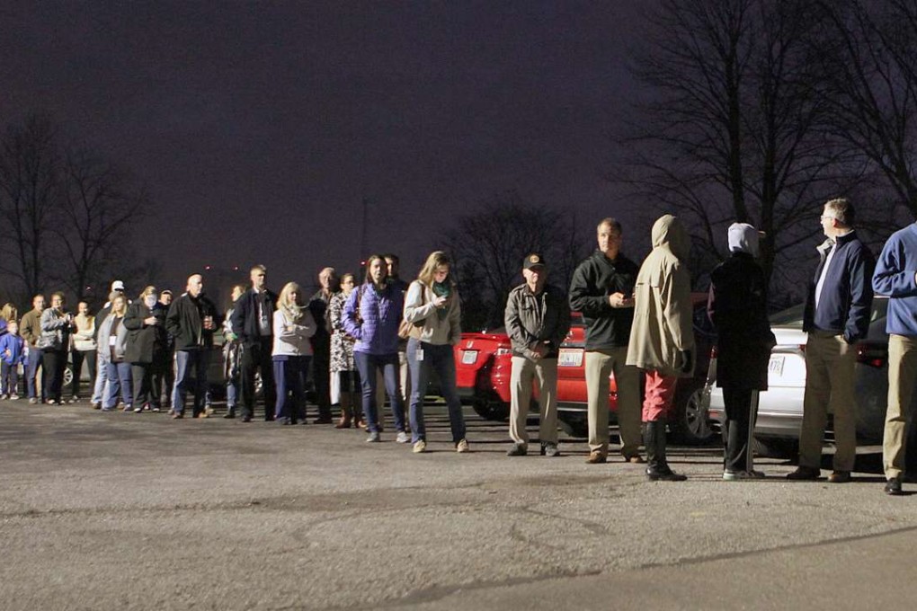 People queue up to vote in the Ohio town of Deerfield. The state went Republican. Photo: EPA