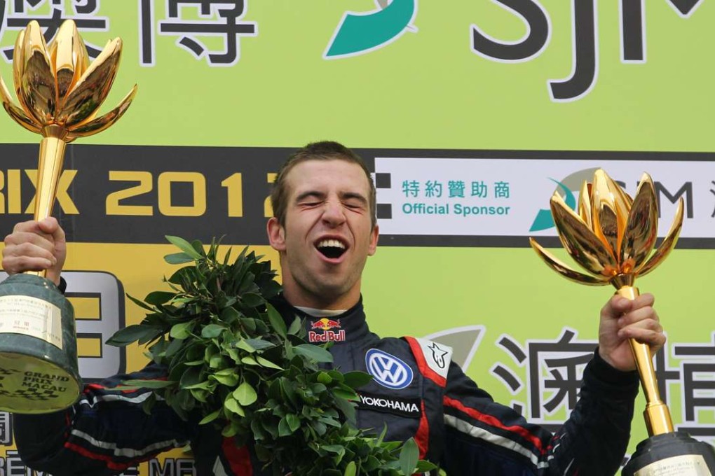 Felix da Costa celebrates with his trophies after winning the 2012 Macau Grand Prix. Photo: Nora Tam