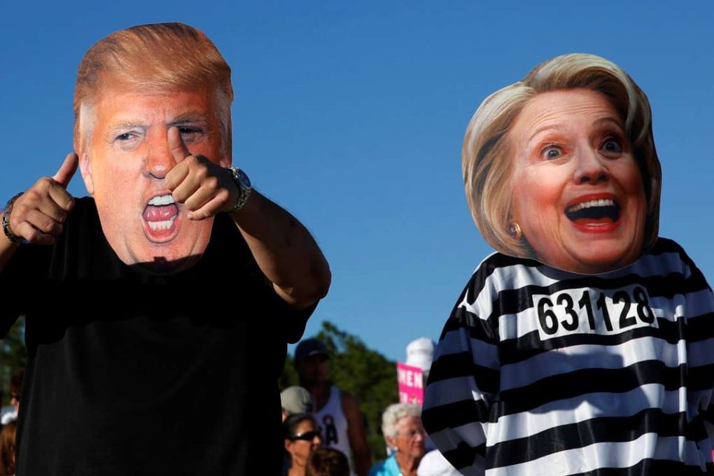 Americans dress up as Donald Trump and Hillary Clinton at a campaign rally in Naples, Florida, last month. Photo: Reuters