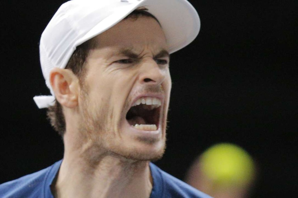 Britain's Andy Murray reacts after he breaks against John Isner of the United States during the final of the Paris Masters tennis tournament at the Bercy Arena in Paris, Sunday, Nov. 6, 2016. Murray won 6-3, 6-7, 6-4. (AP Photo/Michel Euler)