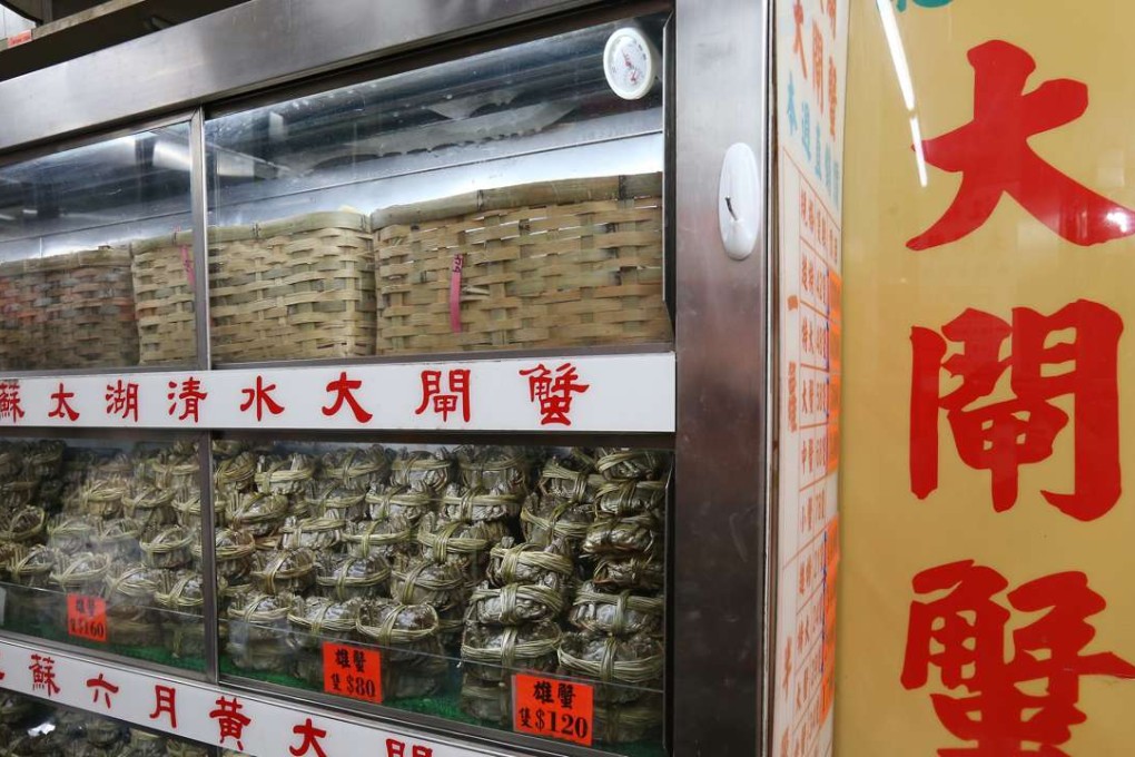 Hairy crabs are seen at Old San Yang in Causeway Bay. The Centre for Food Safety discovered that hairy crab samples from two farms in Jiangsu province contained excessive levels of dioxin and dioxin-like polychlorinated biphenyls. Photo: Dickson Lee
