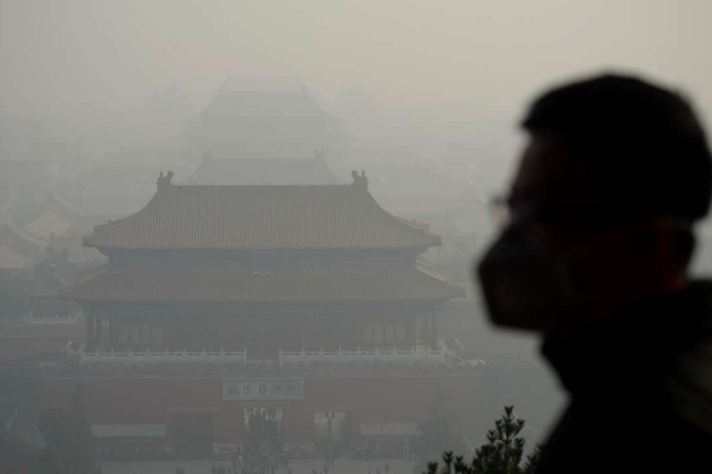 Beijing’s air quality index reading hit 220 at noon on Wednesday – far above the heathy level of 25 for daily exposure stipulated by the World Health Organisation. Photo: AFP