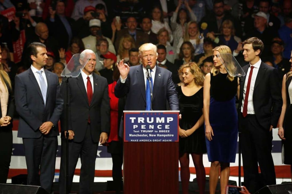 Republican President-Elect Donald Trump, Vice President-Elect Mike Pence and their families rally with supporters at an arena in Manchester, New Hampshire, U.S. November 7, 2016. Photo: Reuters
