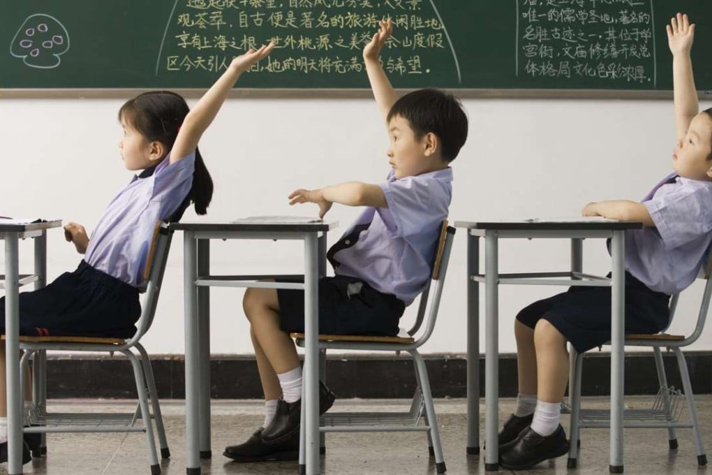 China rolled out its nine-year compulsory education programme in the 1980s. Parents are required to send their school-age children to study, and funding for public schools is guaranteed by the state. Photo: Randy Faris/Corbis