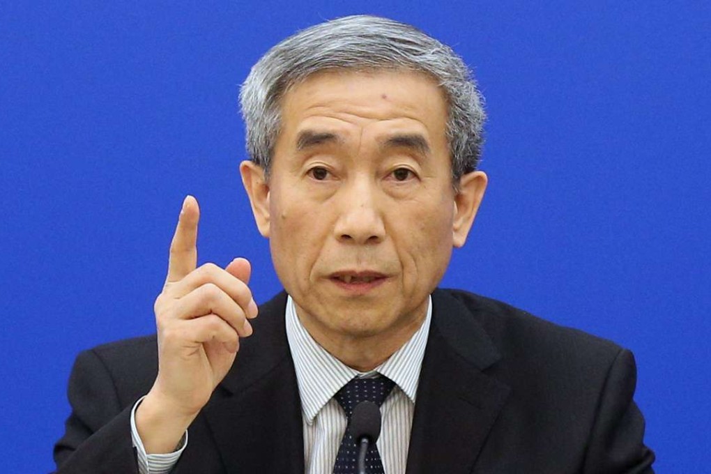 Li Fei, chairman of the Basic Law Committee of the NPC Standing Committee, speaks during a press conference in Beijing, announcing Beijing’s fifth interpretation of the Basic Law. Photo: EPA