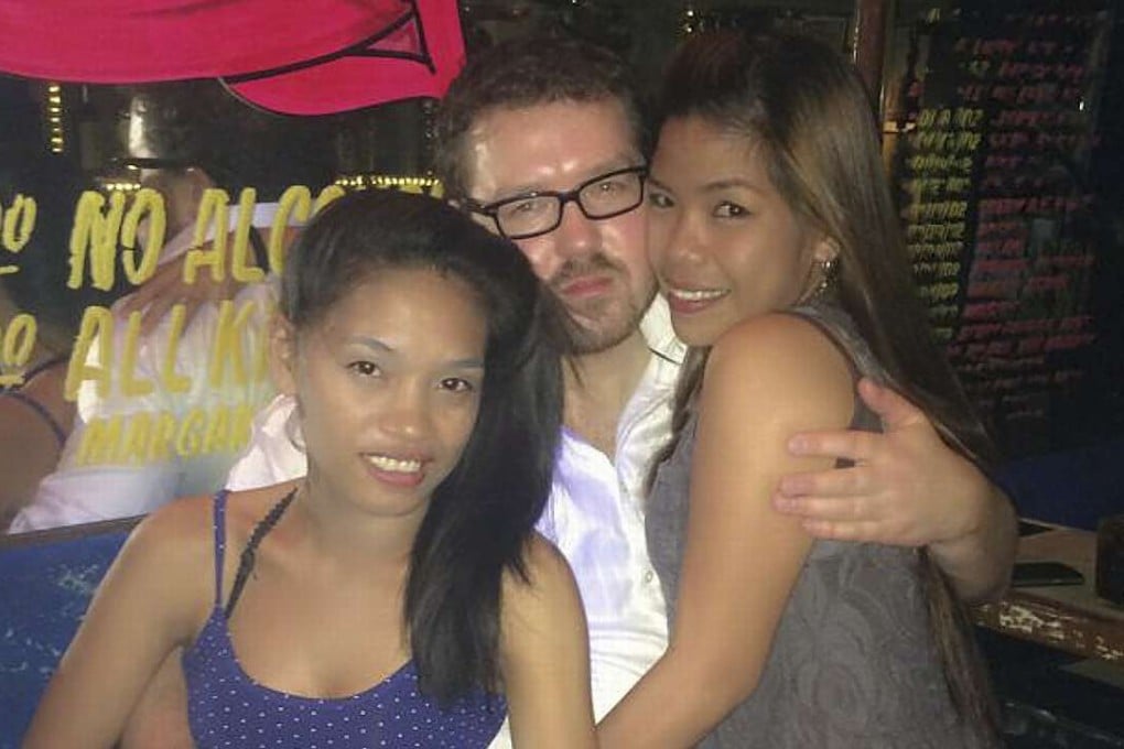 Rurik Jutting with his last girlfriend Joanna Mendoza (right) and another girl in Club Rio, Angeles City. Picture: Red Door News Hong Kong