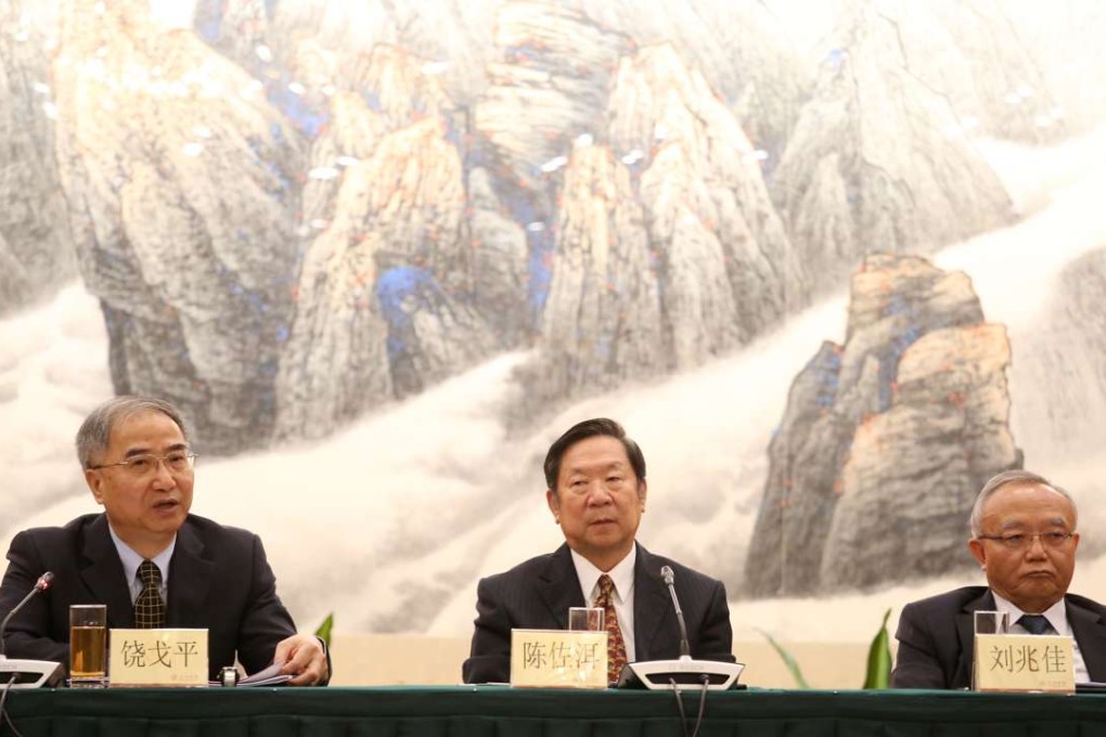 Chen Zuoer (centre), former deputy director of the State Council's Hong Kong and Macau Affairs Office. Photo: K. Y. Cheng