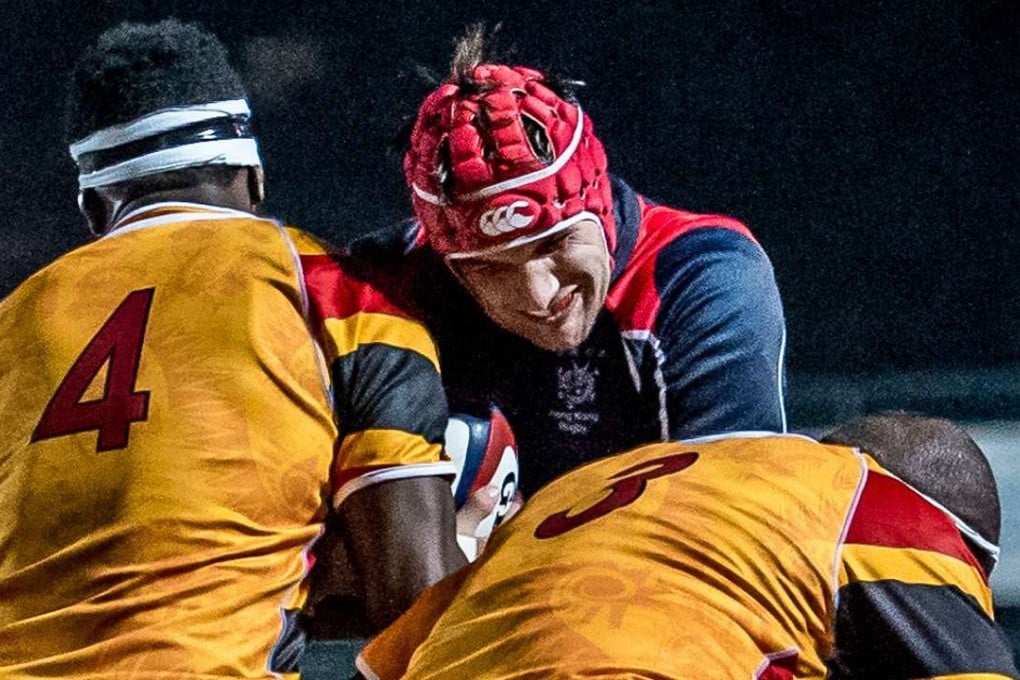 Debutant Will Eversfield tests the Papua New Guinea defence in his side’s impressive 51-5 Cup of Nations victory. Photos: SCMP Pictures