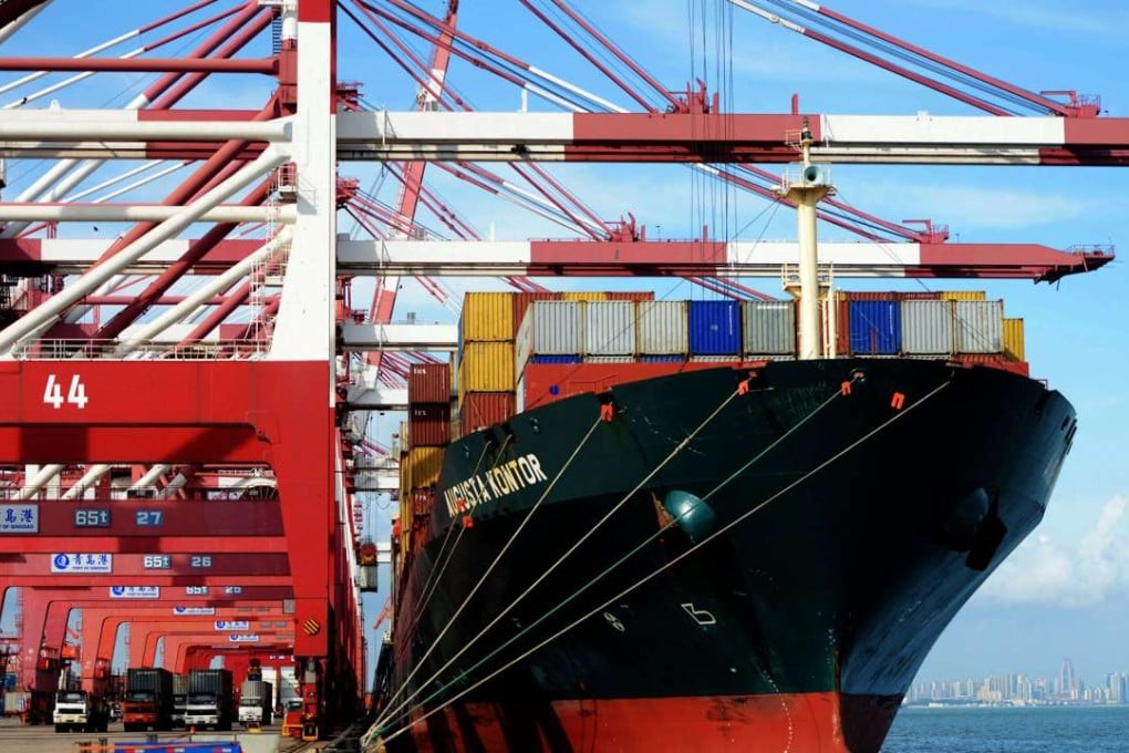 Cargo containers on a ship at a port in Qingdao, eastern China. Trump’s threat of punitive trade measures could have a huge impact, both on China and on US consumers. Photo: AFP