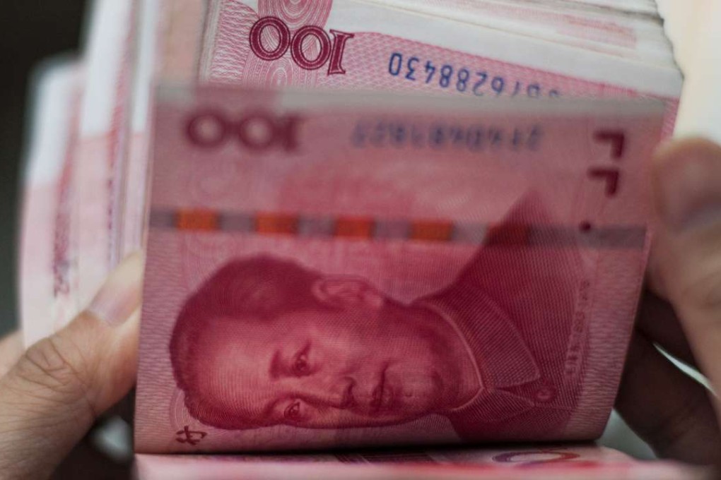 Pressure has been building on the yuan to depreciate since the International Monetary Fund included the currency in its special drawing rights basket. Photo: AFP