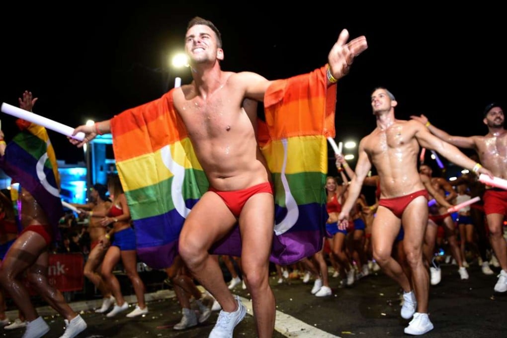 Participants takes part in the Sydney gay and lesbian Mardi Gras Parade in Sydney on March 5, 2016. Photo: AFP